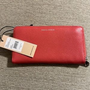 Zippy wallet. Rebecca Minkoff. Color grapefruit. New with tag marked $128.00